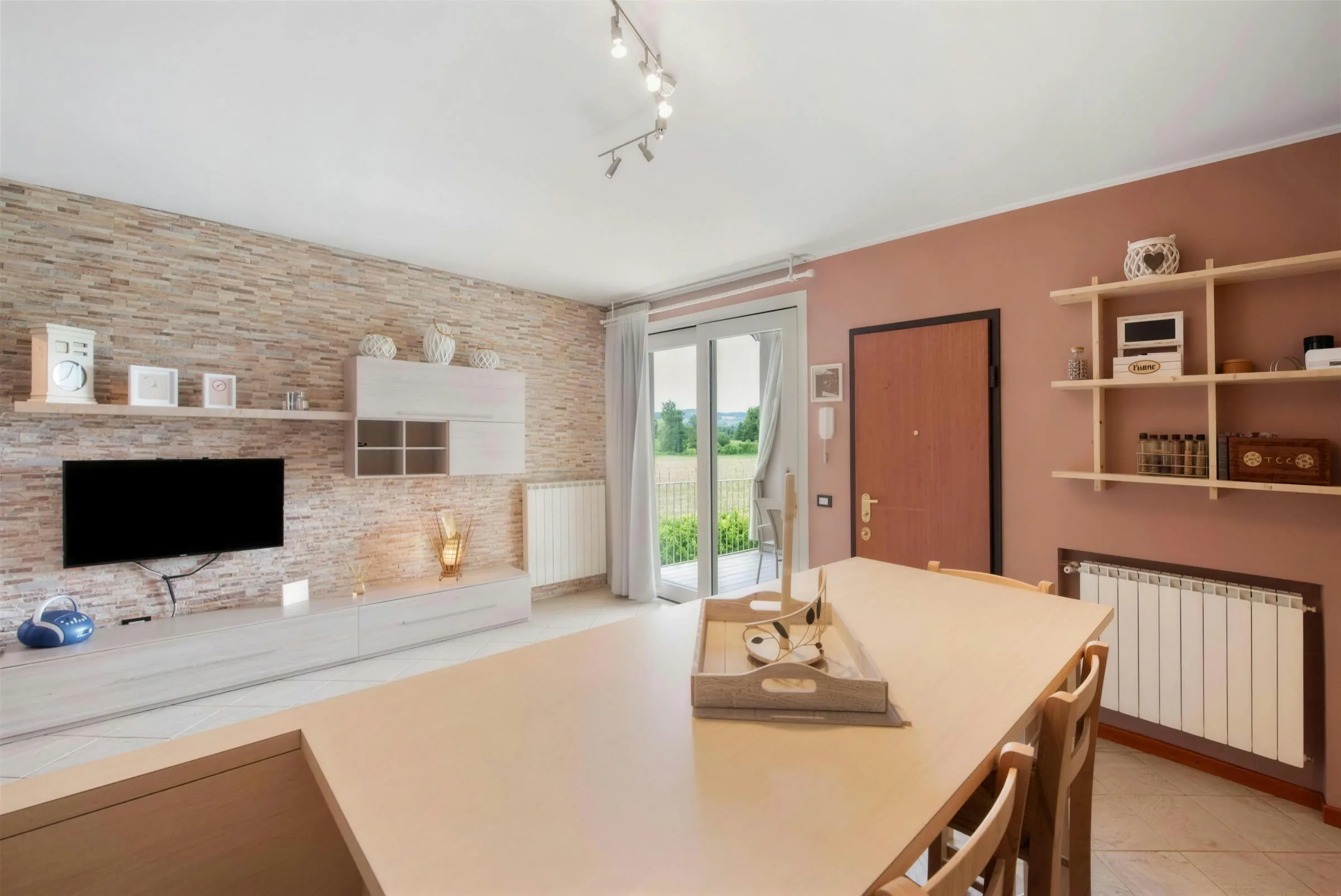 Dining area with stone wall